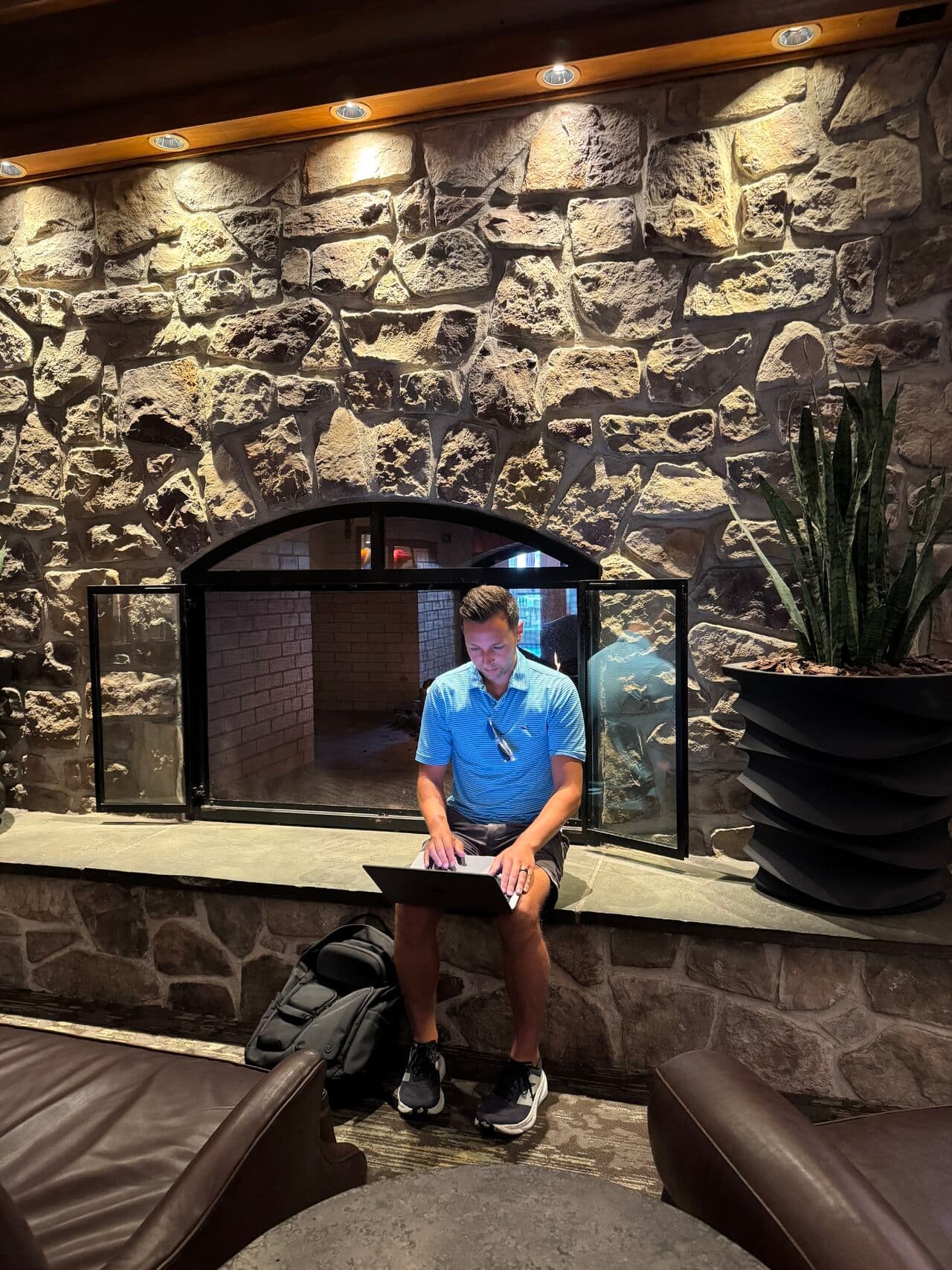 Ken Yarmosh working on a laptop in a lobby